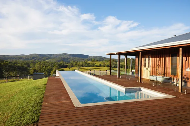 This rural timber farmhouse comes with a dreamy outdoor tub