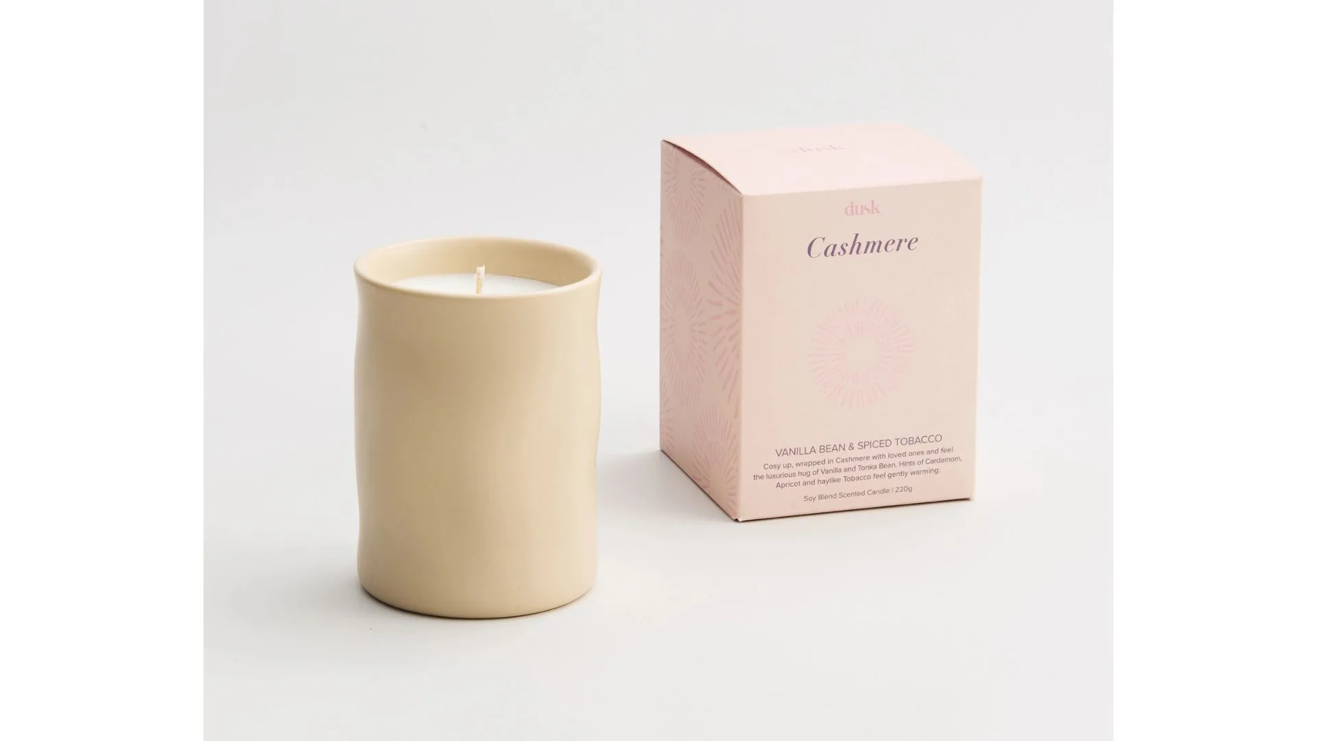 A vanilla bean and smoked tobacco scented candle