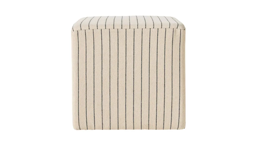 A striped square ottoman, perfect for winter decorating