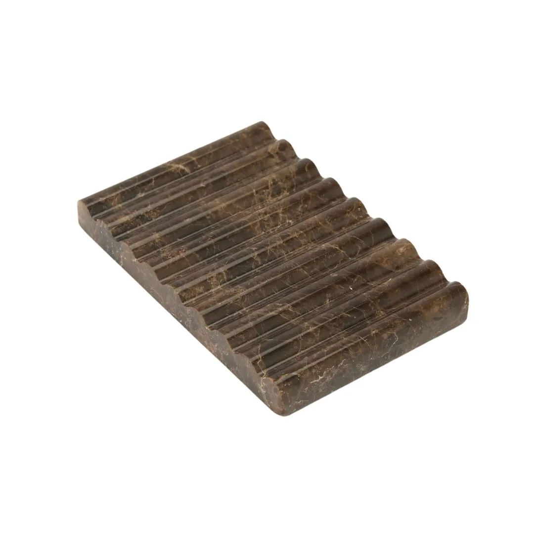 A brown marble soap dish. 