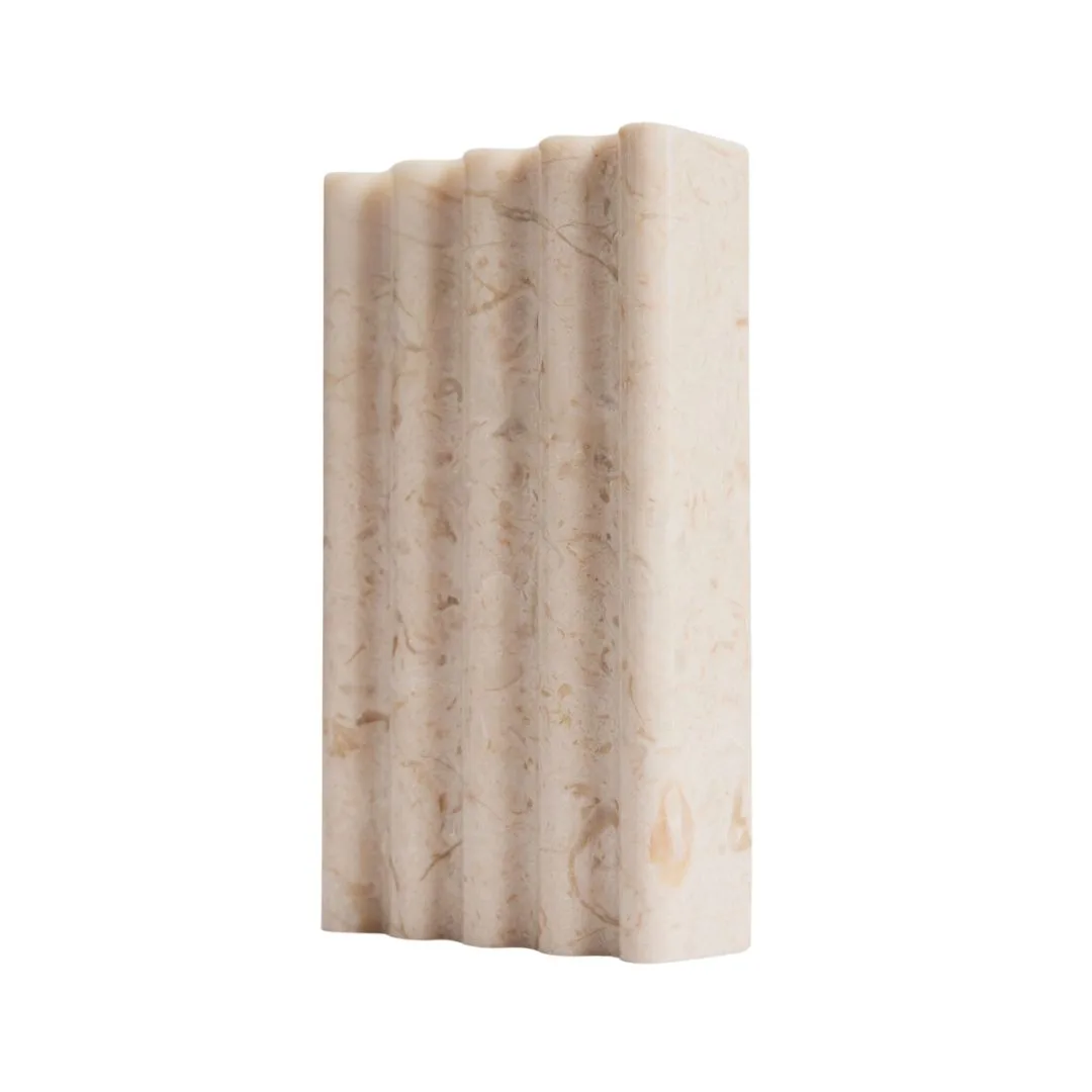 A pink marble rectangular soap dish. 