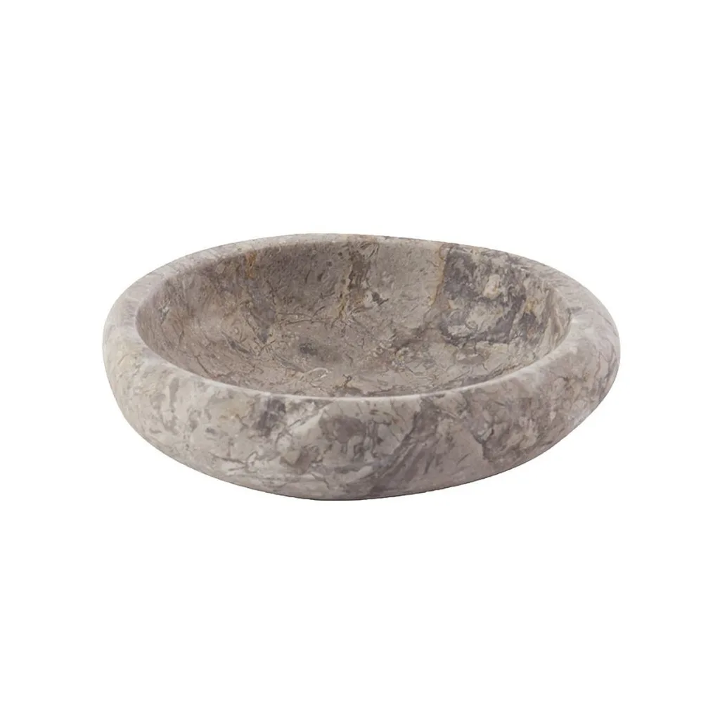 A dark grey circular soap dish.