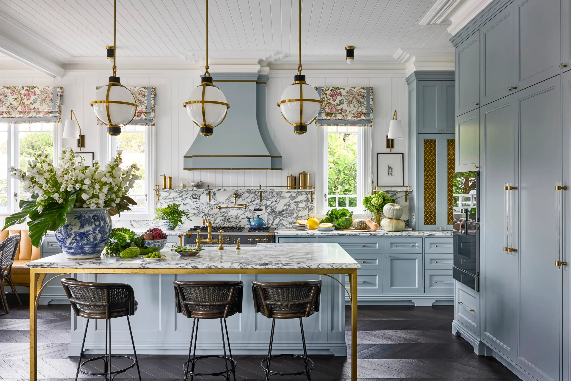 An opulant blue kitchen in a Sydney heritage home. 