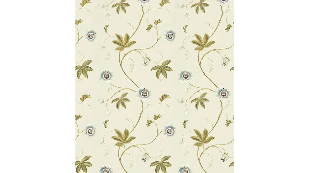 A fabric with a cream background and green vine pattern