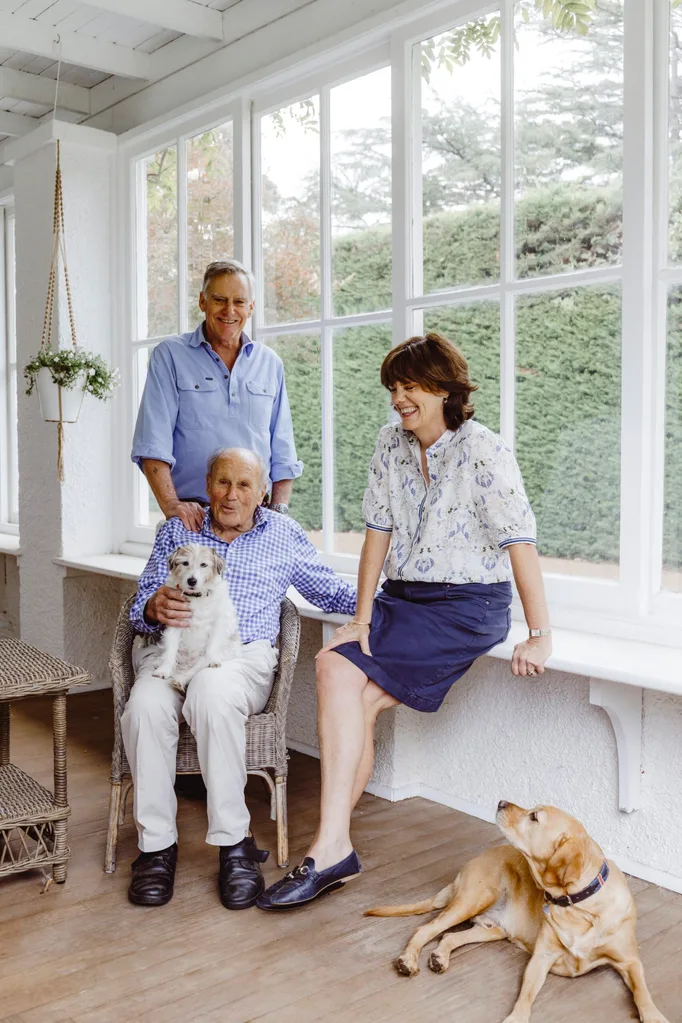The owner of a historical homestead pictured with his dad, sister and dog.