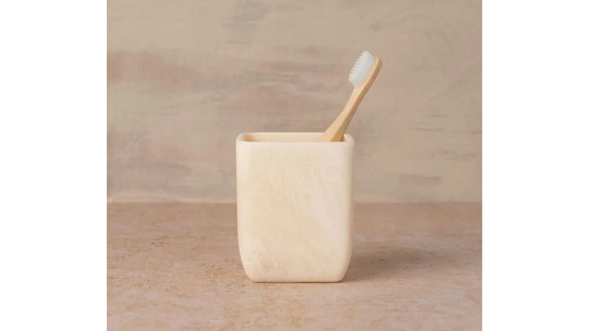 A square toothbrush holder