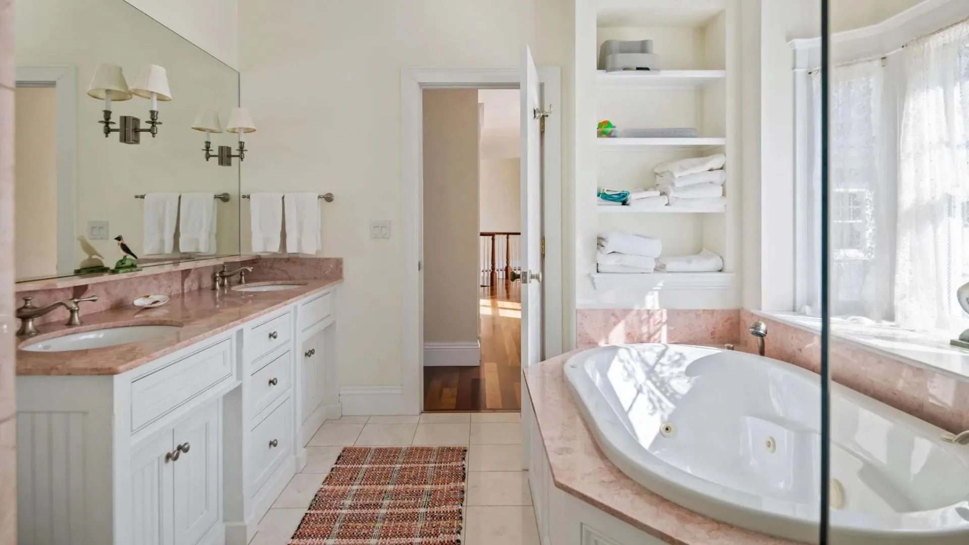 A bathroom with a bath in a home in Maine, on the former estate of Bette Davis. 