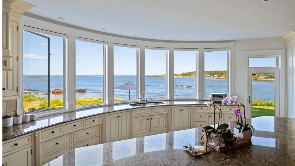 A kitchen with windows overlooking the ocean at Bette Davis's former Maine estate.