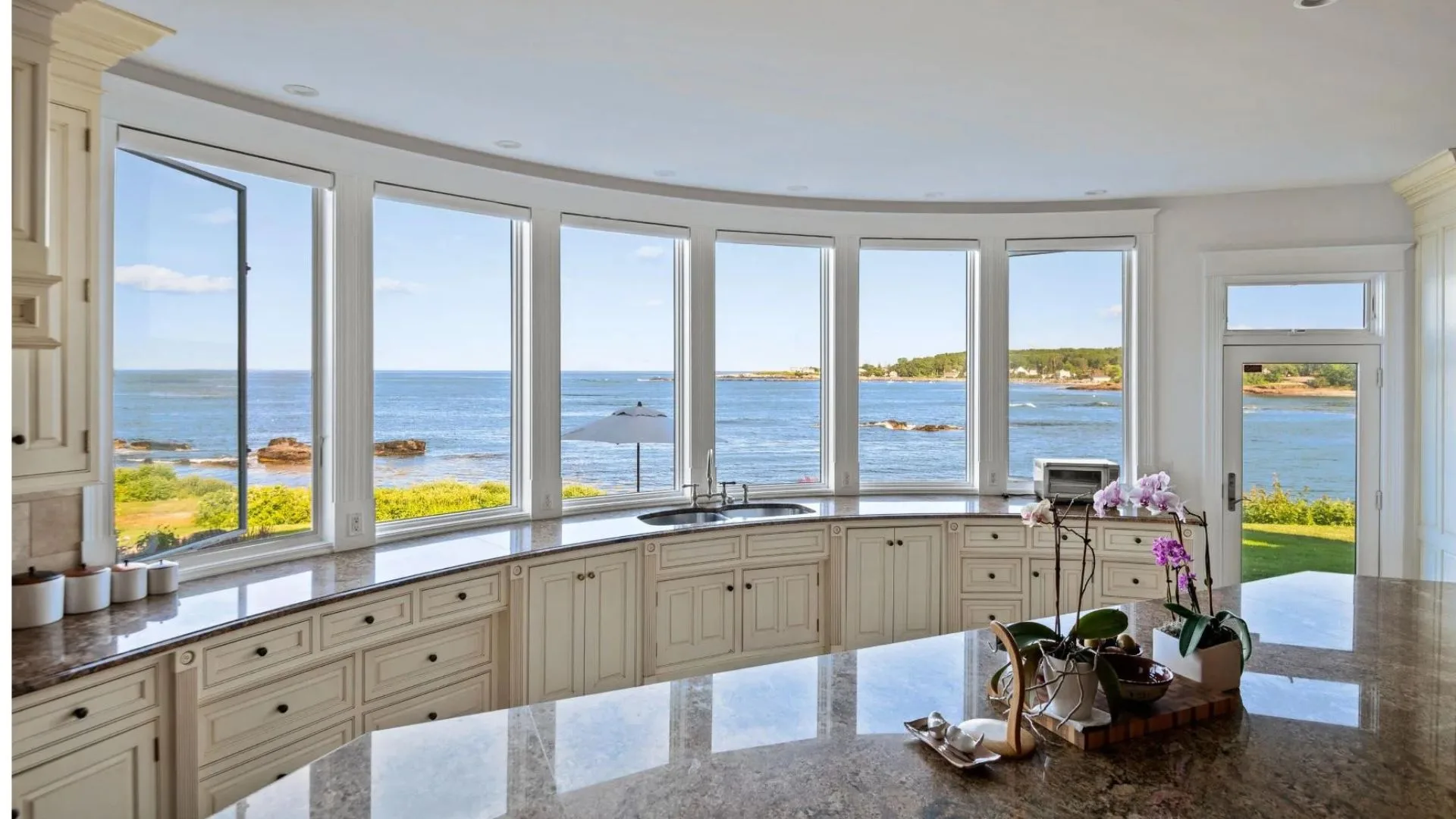 A kitchen with windows overlooking the ocean at Bette  Davis's former Maine estate. 