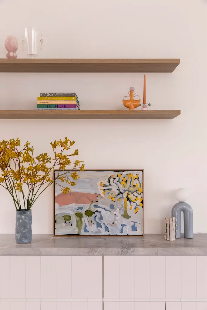 Pink shelving in a renovated bungalow.