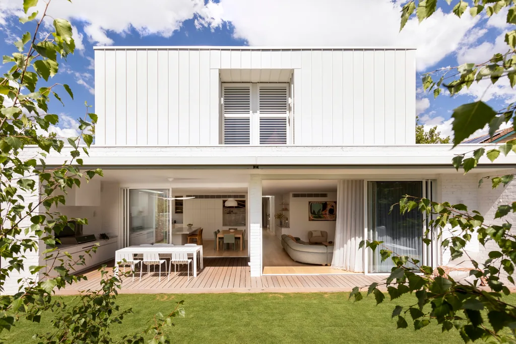 The exterior of a recently renovated bungalow with a seamless indoor outdoor connection.