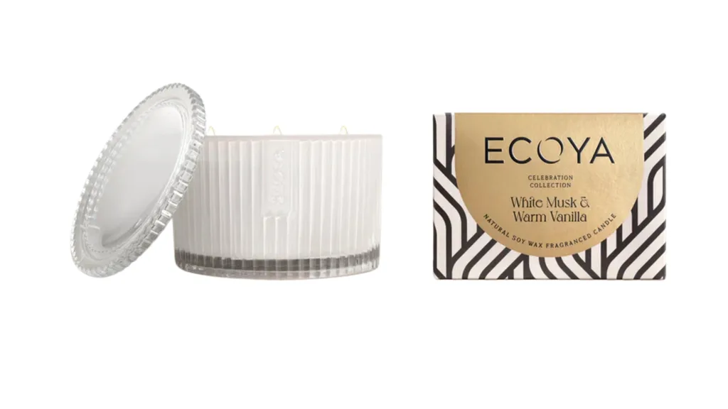A luxury scented candle from Ecoya with three wicks and a ribbed glass container.