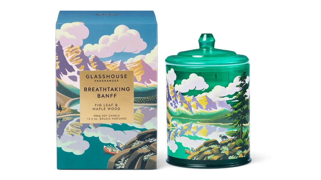 Fig leaf and maple wood scented candle from Glasshouse Fragrances. The container and matching lid is green glass with a colourful mountainous landscape printed on it.