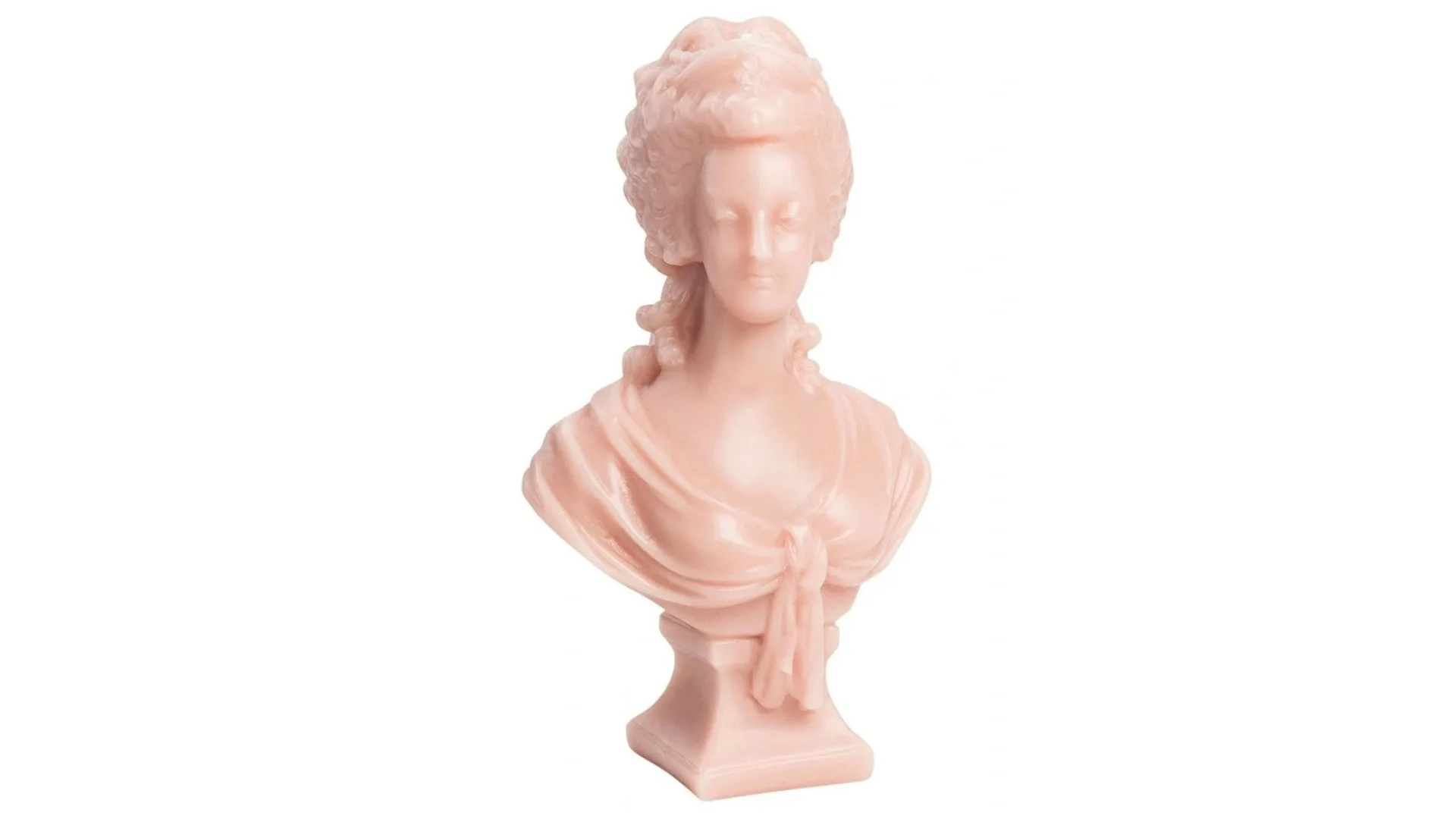 A pink bust of Marie Antoinette that is also a candle from Trudon.