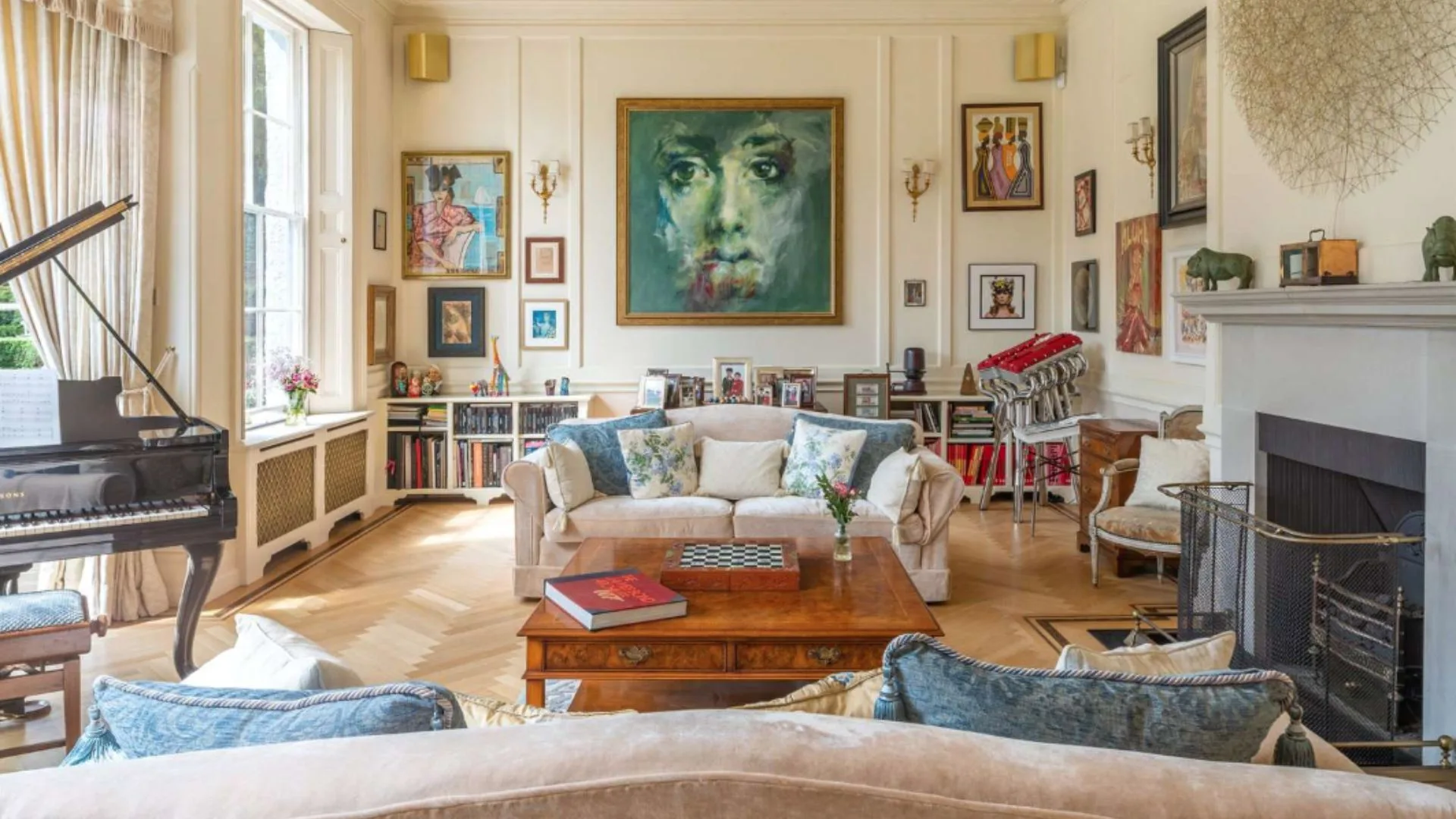 Mel B's living room is filled with books, art and a piano. 