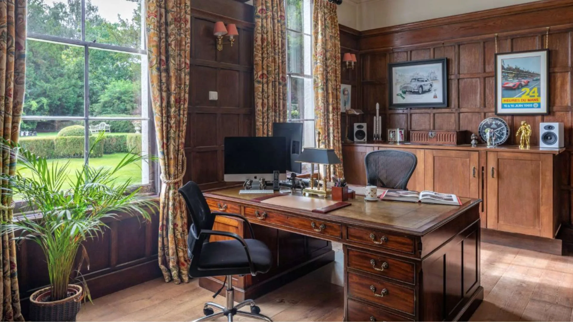 Mel B's study with floral curtains and antique furniture. 