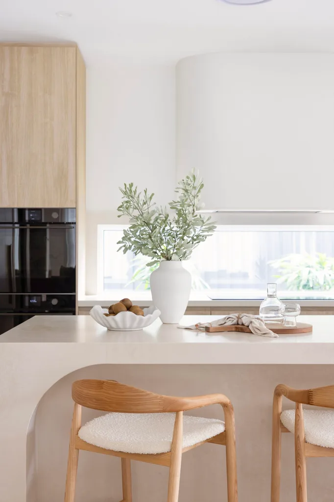 The kitchen island in an Oak and Orange new build.