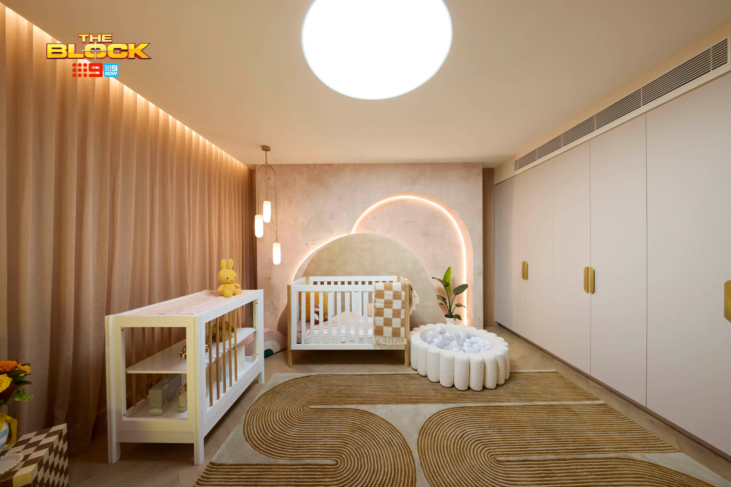 Can and Han's beige nursery. 