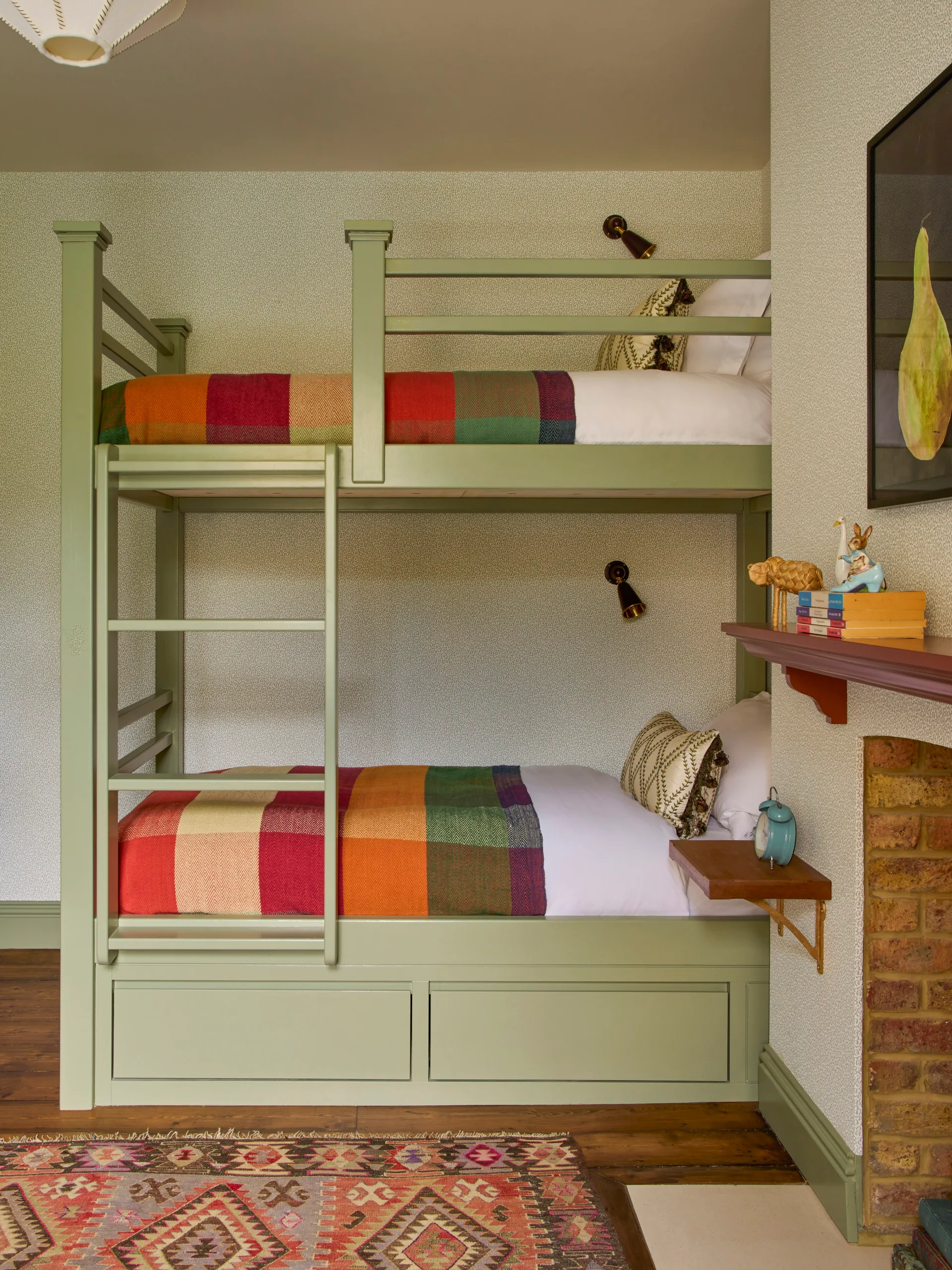 Built in bunks with rainbow bedspreads. 
