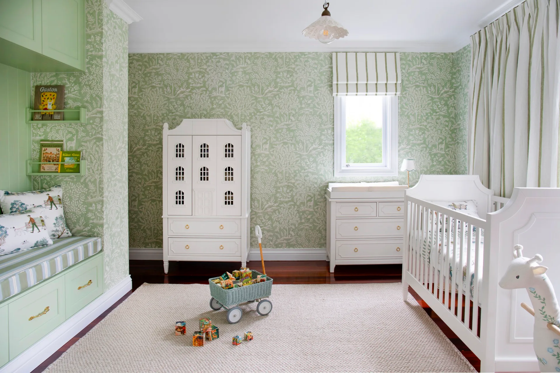 A green and white nursery. 