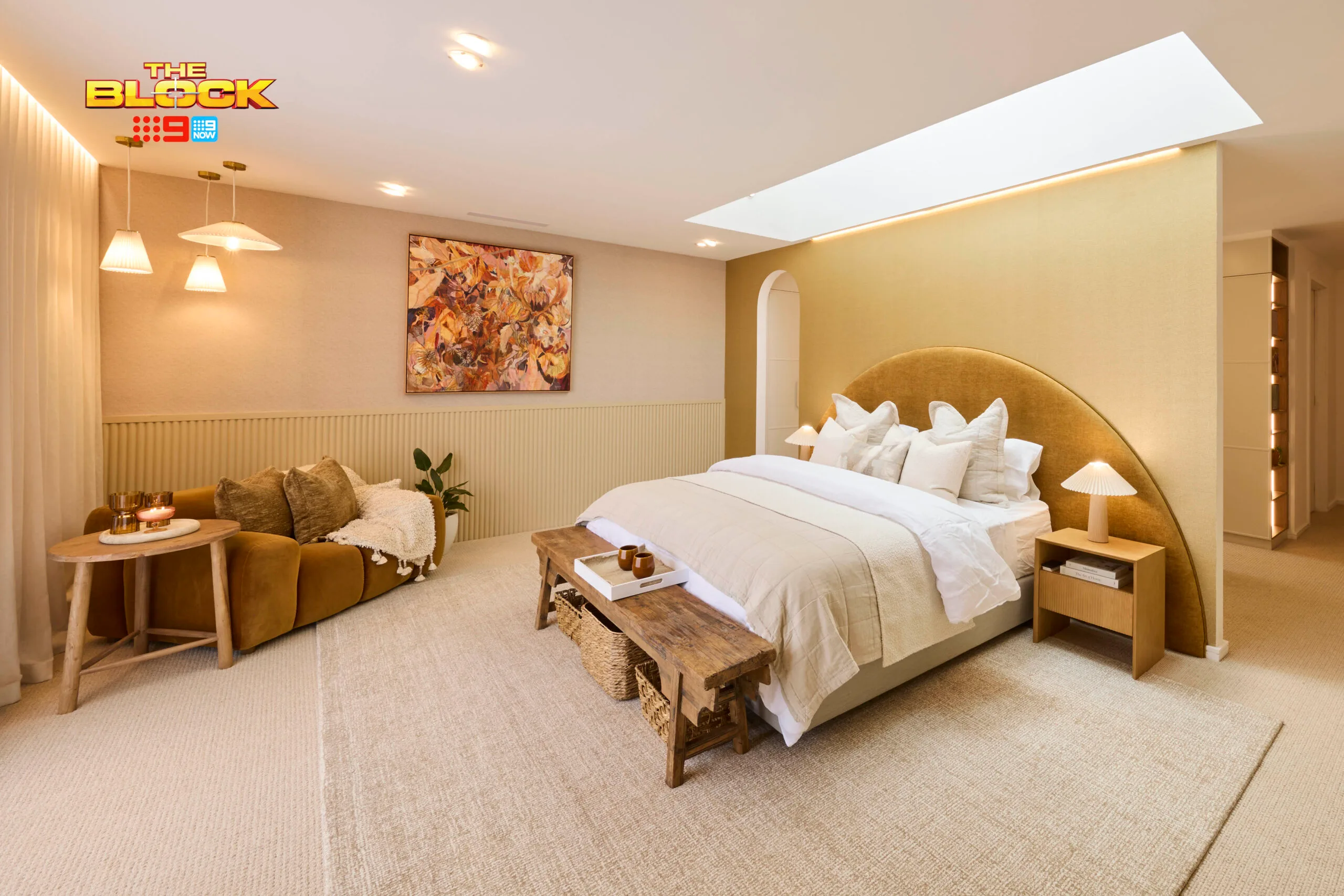 Britt and Taz's luxurious neutral main bedroom. 