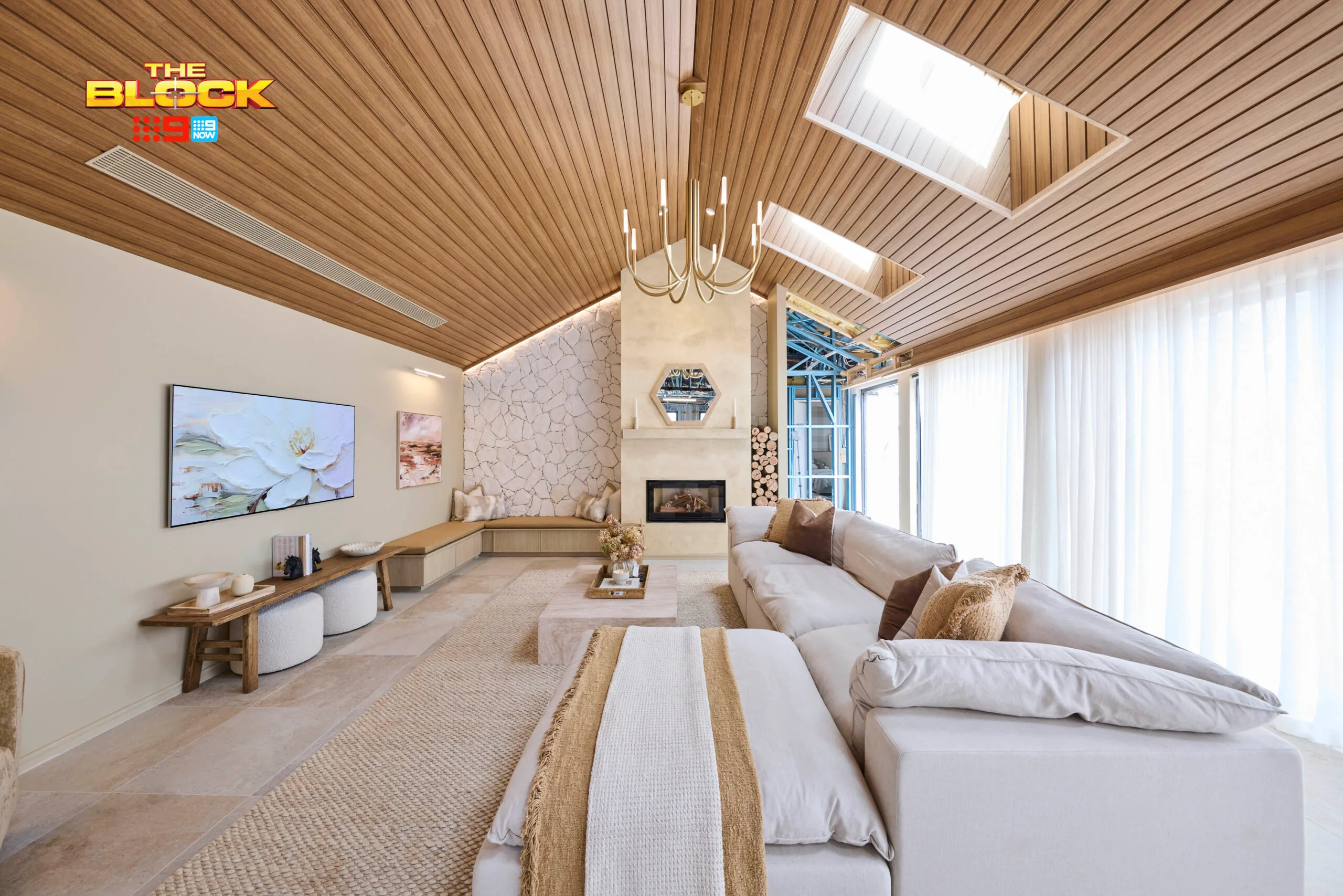 Timber paneled ceilings and stone clad wall from Britt and Taz's living room on the Block. 