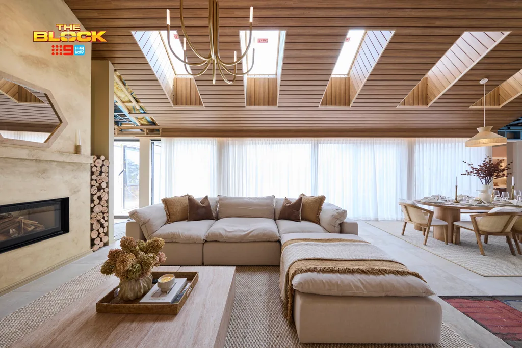 Timber paneled ceilings with skylights and stone clad wall from Britt and Taz's living room on the Block.
