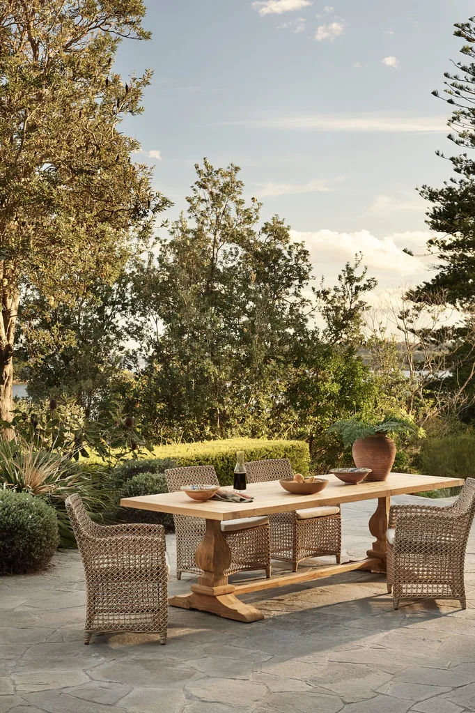 Outdoor dining table on tiled patio
