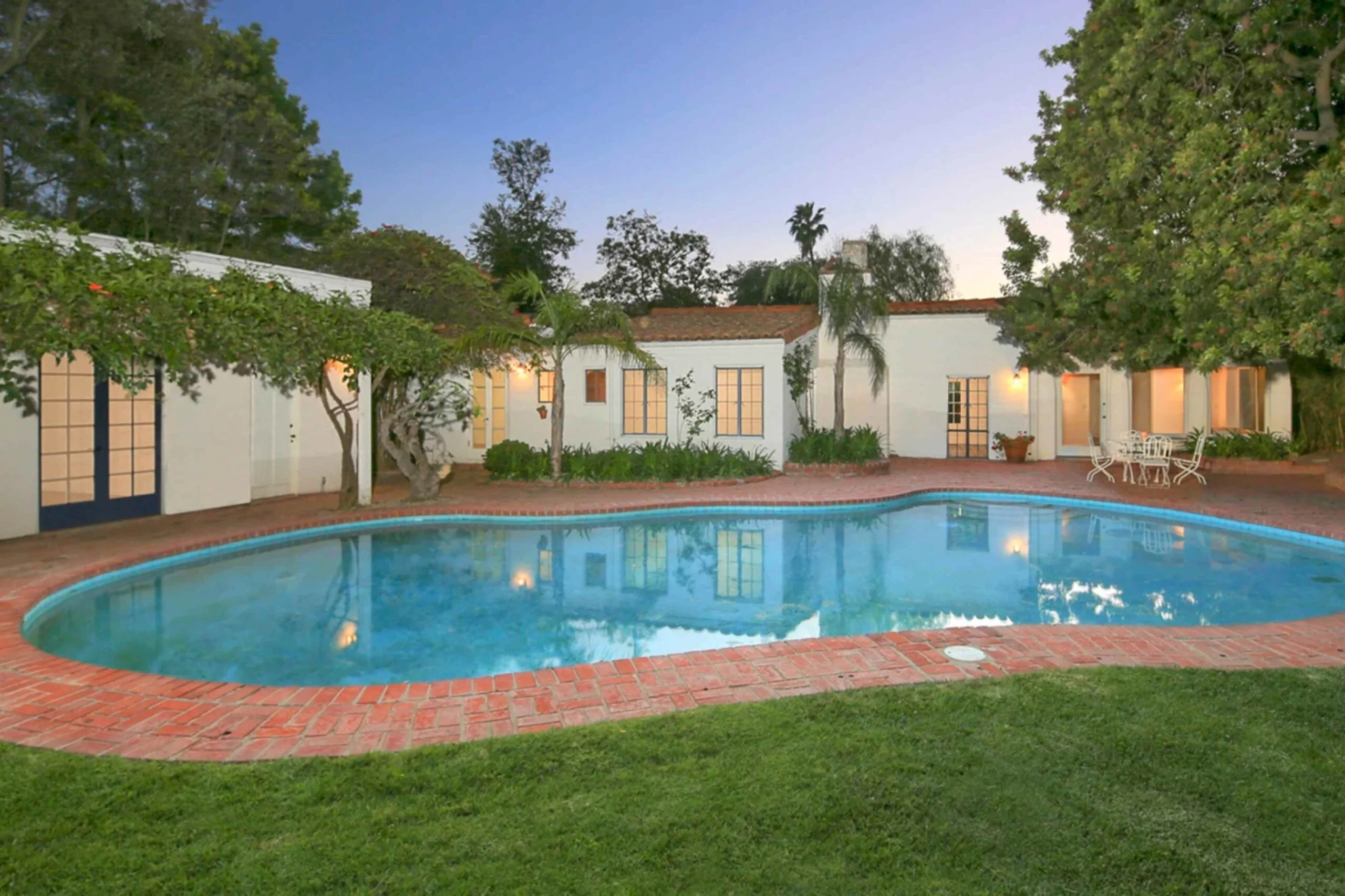 Backyard swimming pool at Marilyn Monroe's Spanish-style Brentwood, California, home.