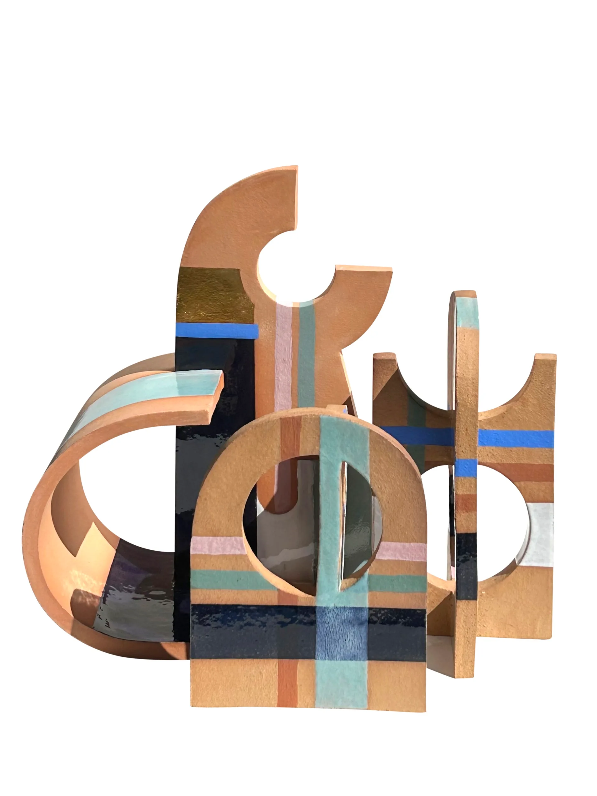 An abstract ceramic sculpture made from clay. It features stripes of blues, pinks, browns andblack.