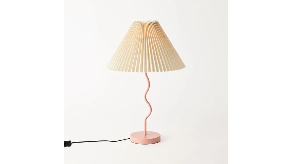 Table lamp with curved base and pleated lampshade