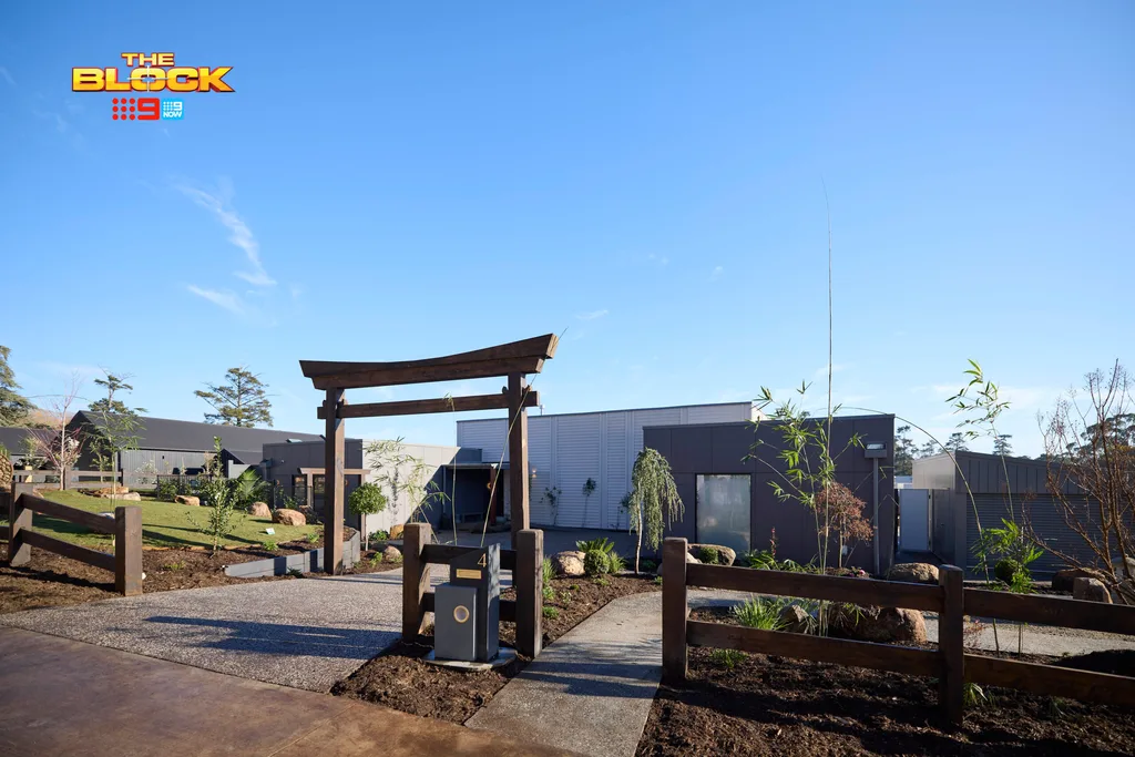 Han and Can's front yard with a Japanese Arbor on the Block.