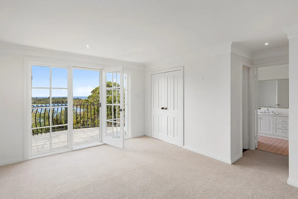main bedroom in jennifer hawkins terrigal home for sale
