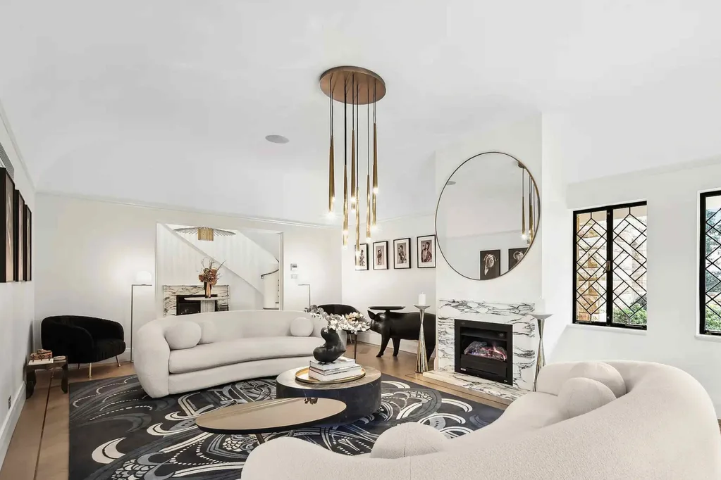 Black and white formal living room in a Walter Burley Griffin house in Pymble.
