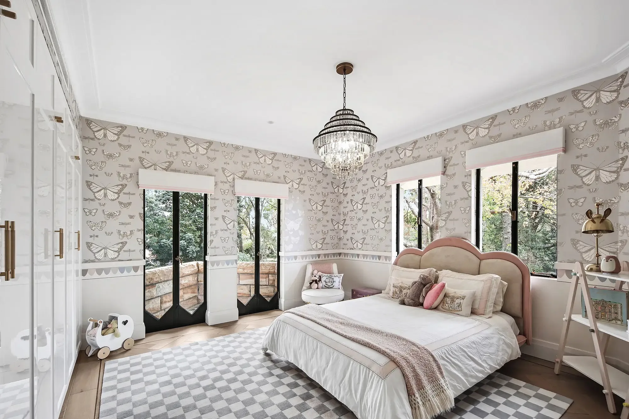 Girls bedroom with butterfly wallpaper in a Walter Burley Griffin house in Pymble.