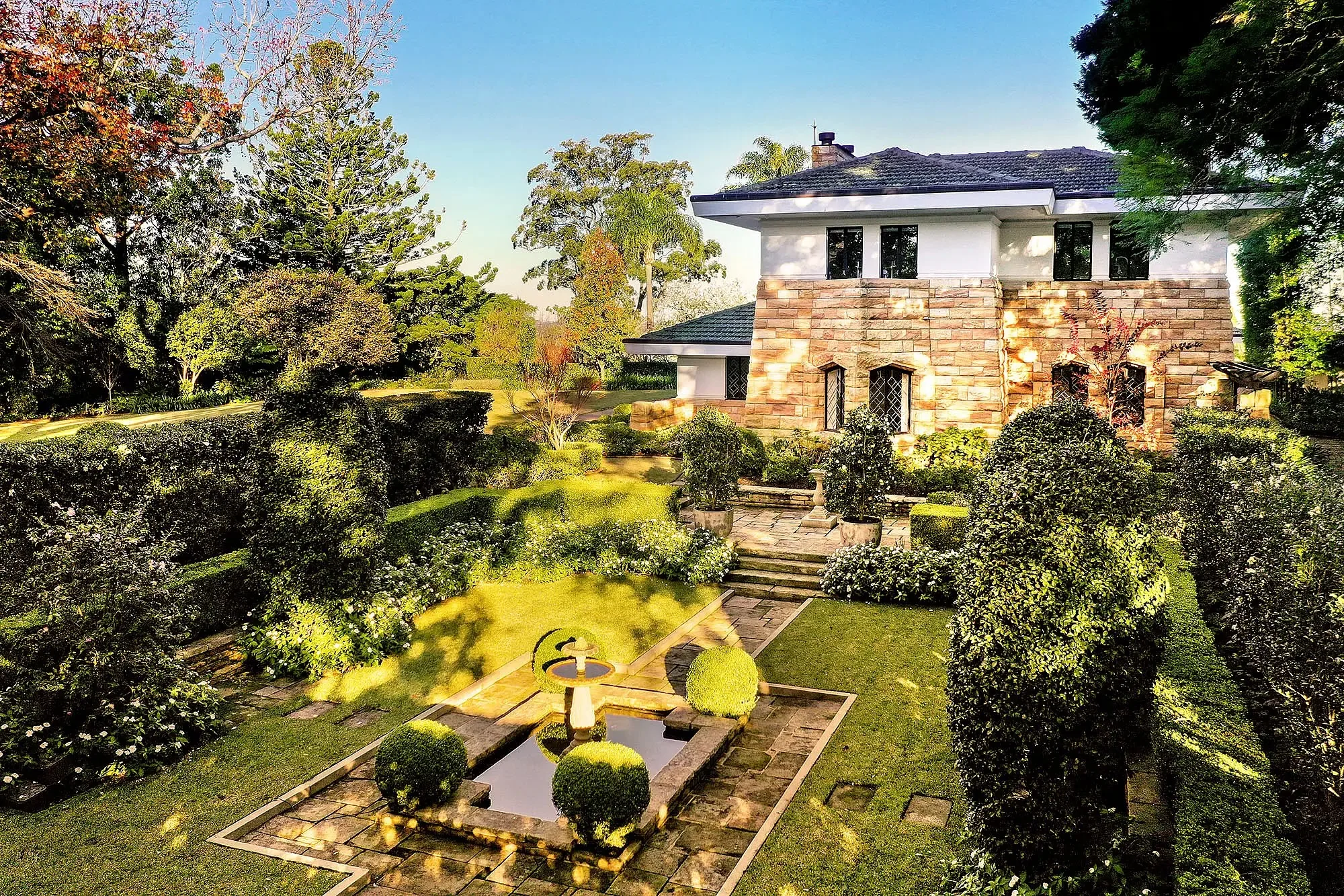 Paul Bangay-designed gardens and pond at a Walter Burley Griffin house in Pymble.