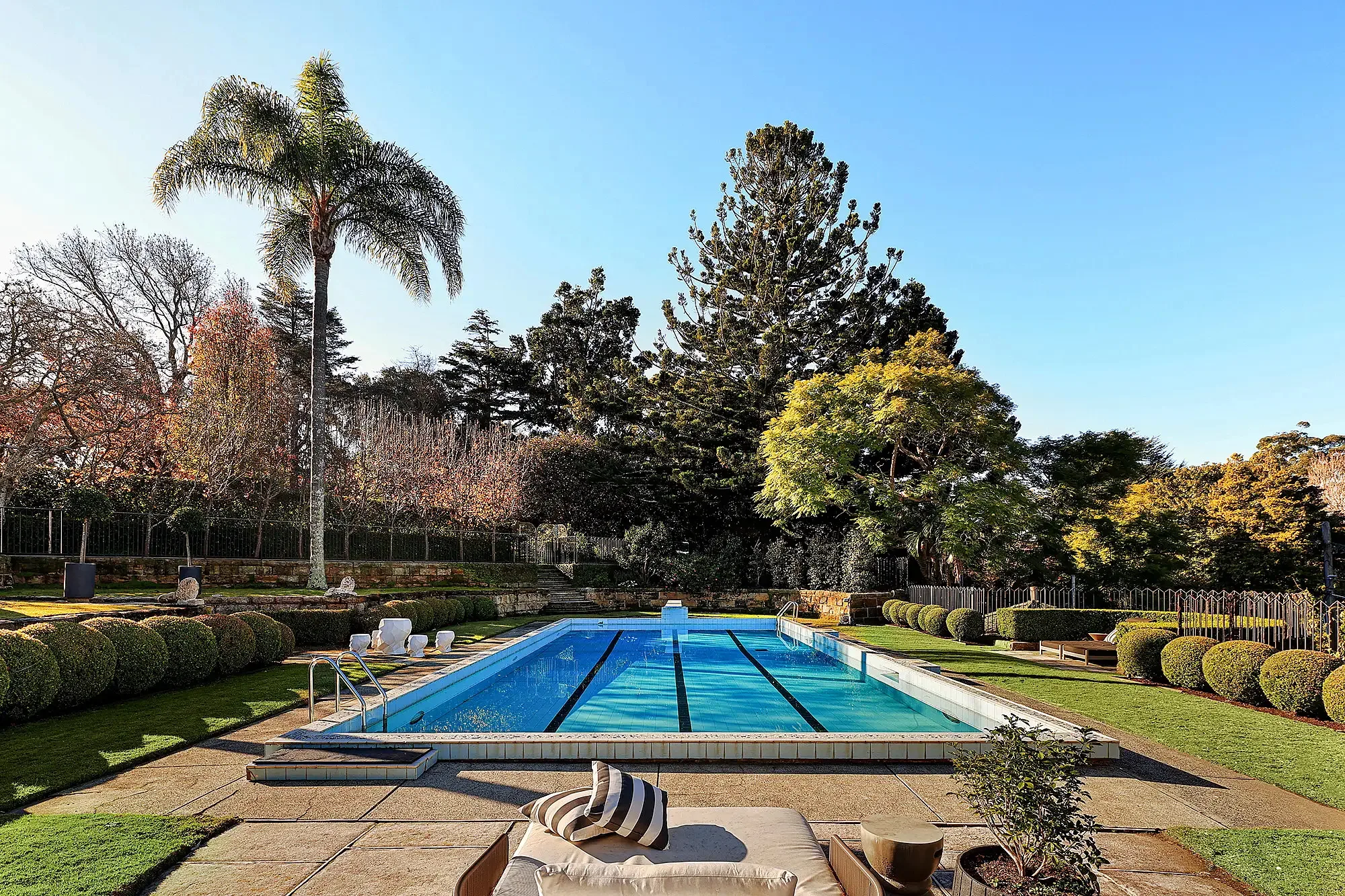 Swimming pool and Paul Bangay-designed gardens at a Walter Burley Griffin house in Pymble.