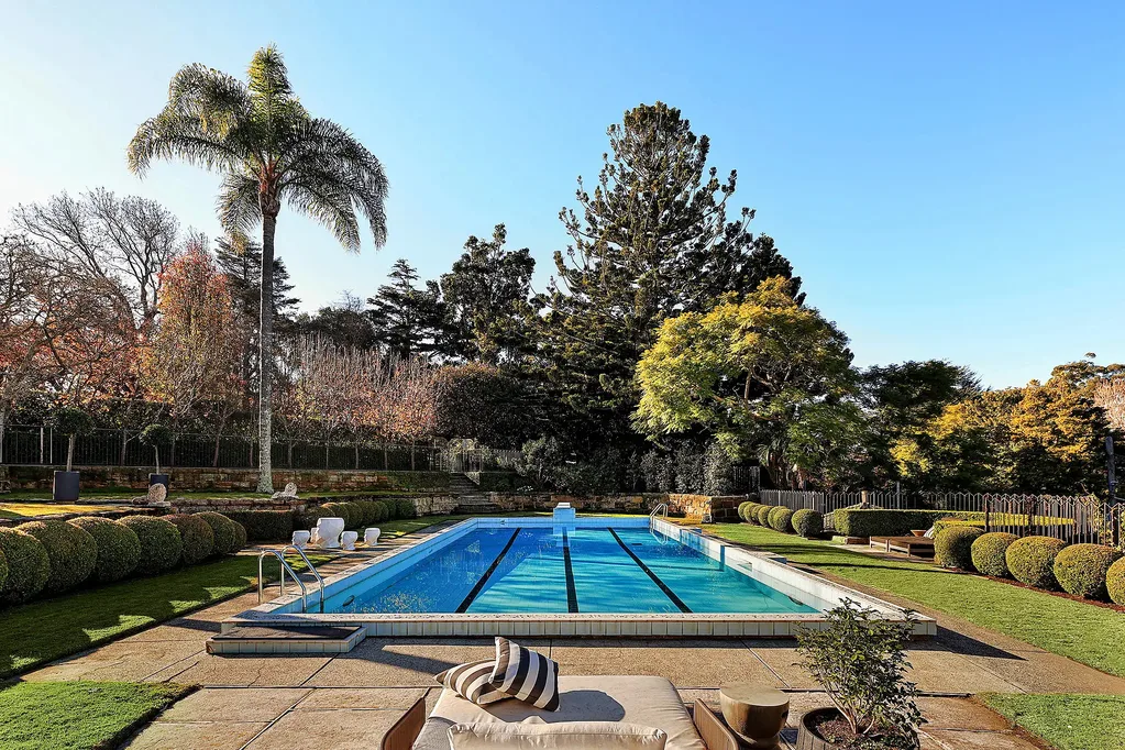 Swimming pool and Paul Bangay-designed gardens at a Walter Burley Griffin house in Pymble.