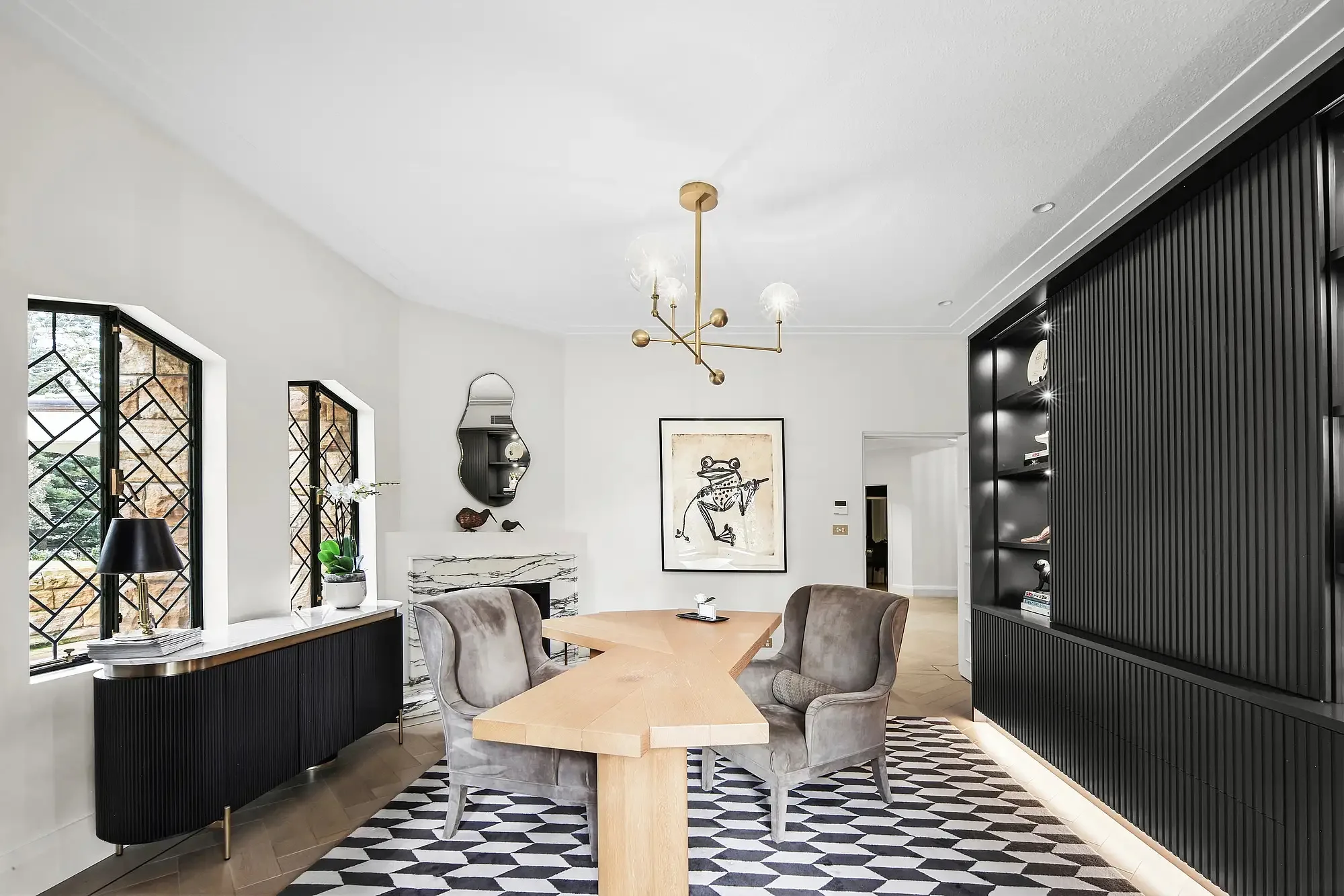 Black and white dining room or study in Walter Burley Griffin house in Pymble.