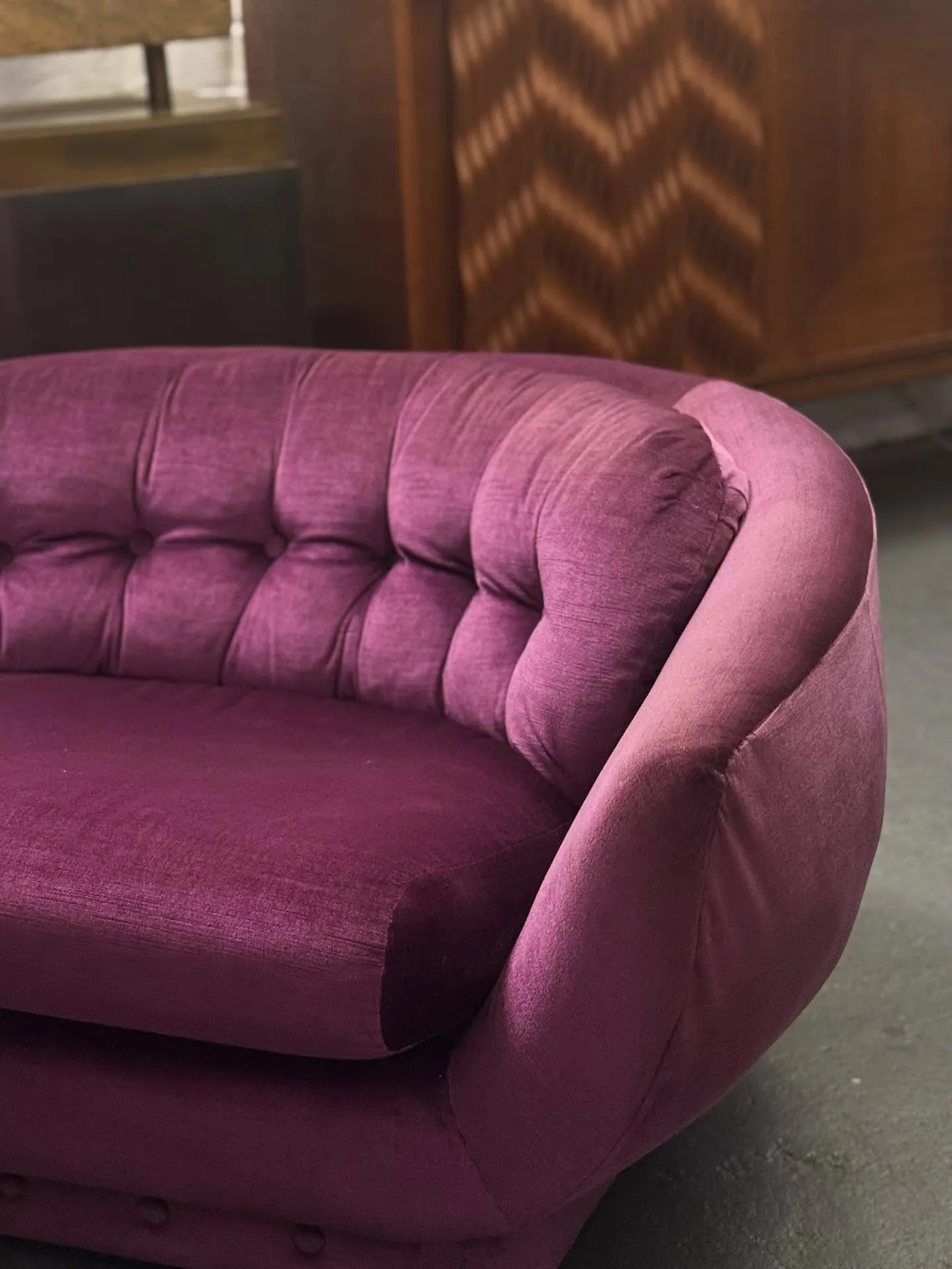 purple vintage couch at smith street bazaar second hand furniture store in melbourne 