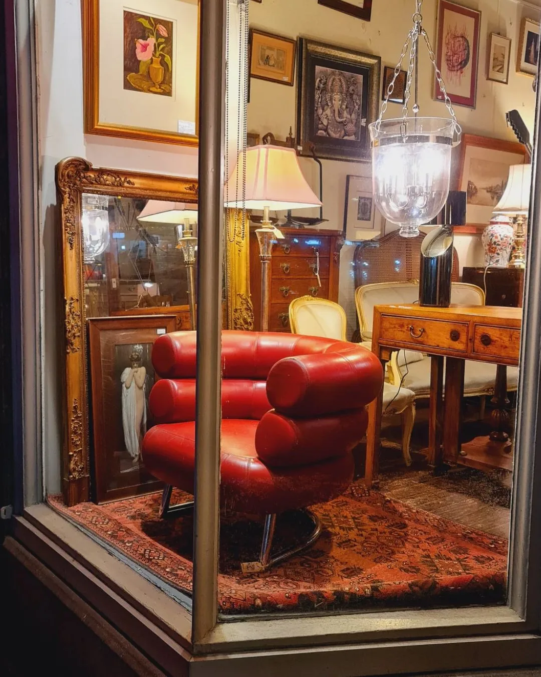 a vintage red chair at grays second hand furniture store melbourne