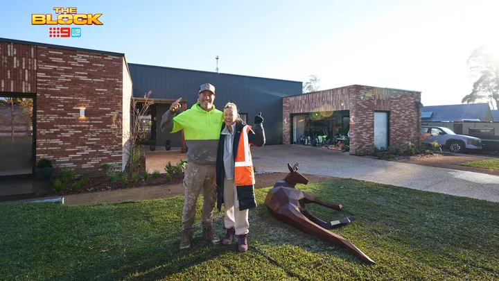 Sonny and Alicia's front yard with a kangaroo sculpture.