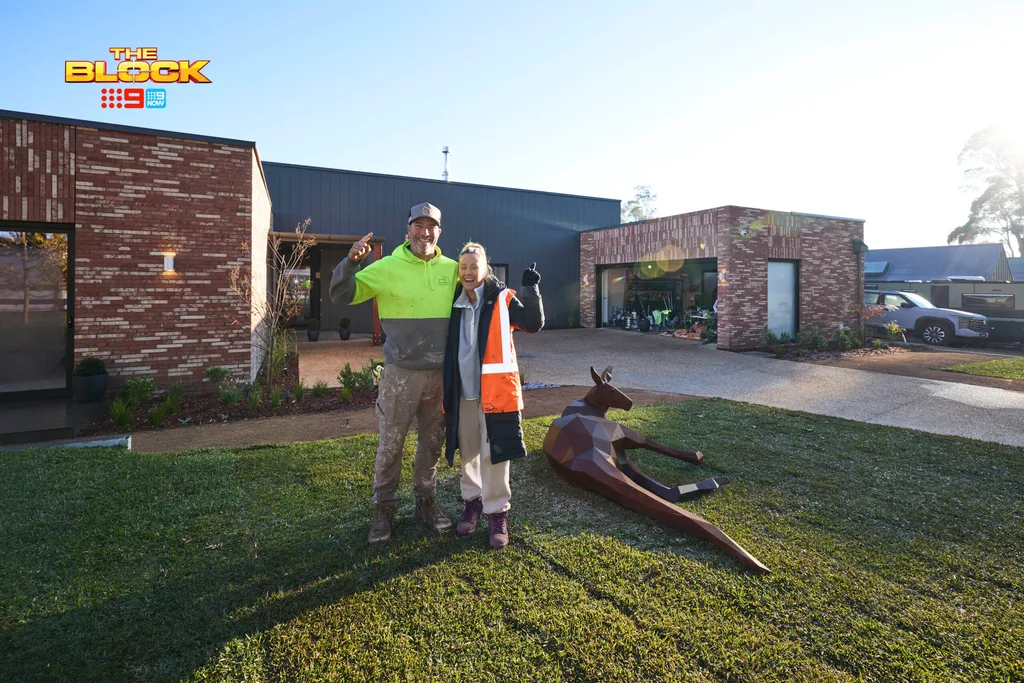 Sonny and Alicia's front yard with a kangaroo sculpture.