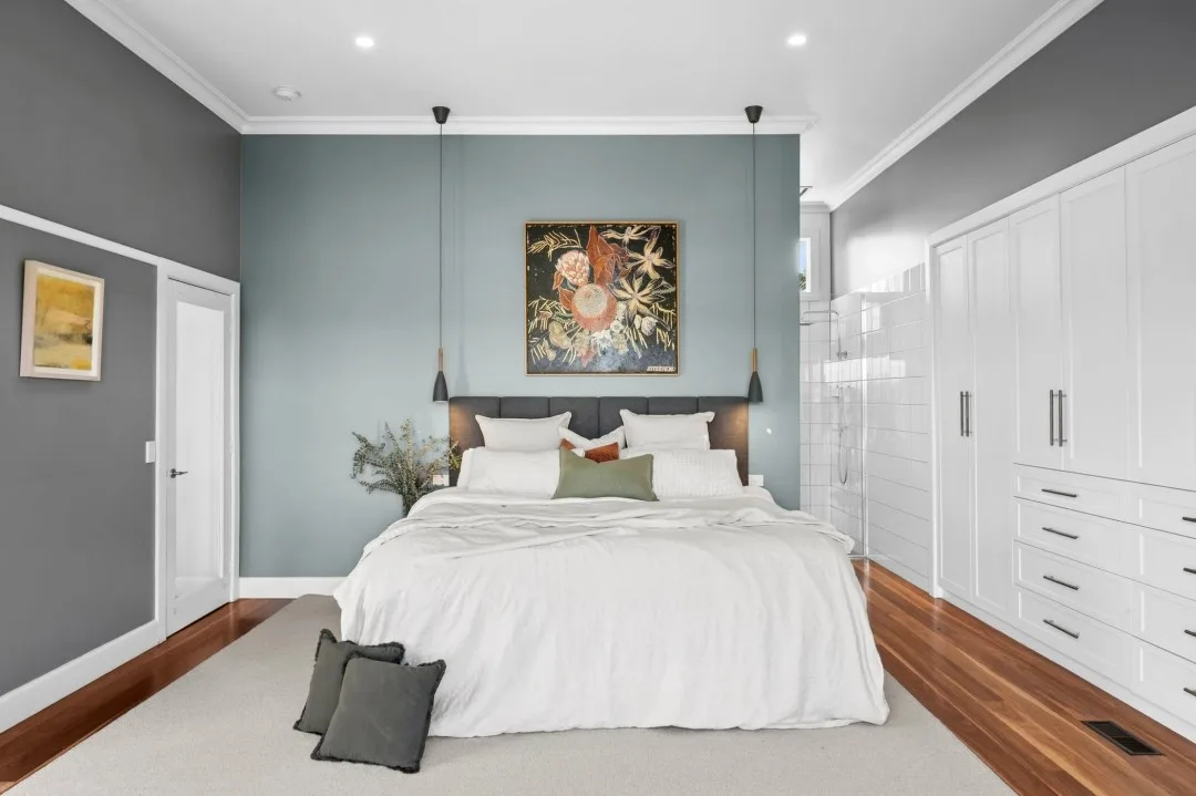 Main bedroom and ensuite in Tom and Emma Hawkins' farmhouse. 