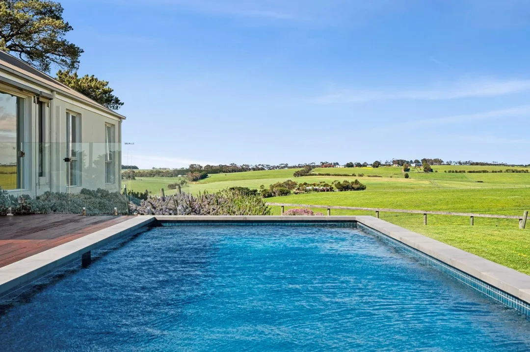 Pool and views of hills at Tom and Emma Hawkins' Barrabool farm.