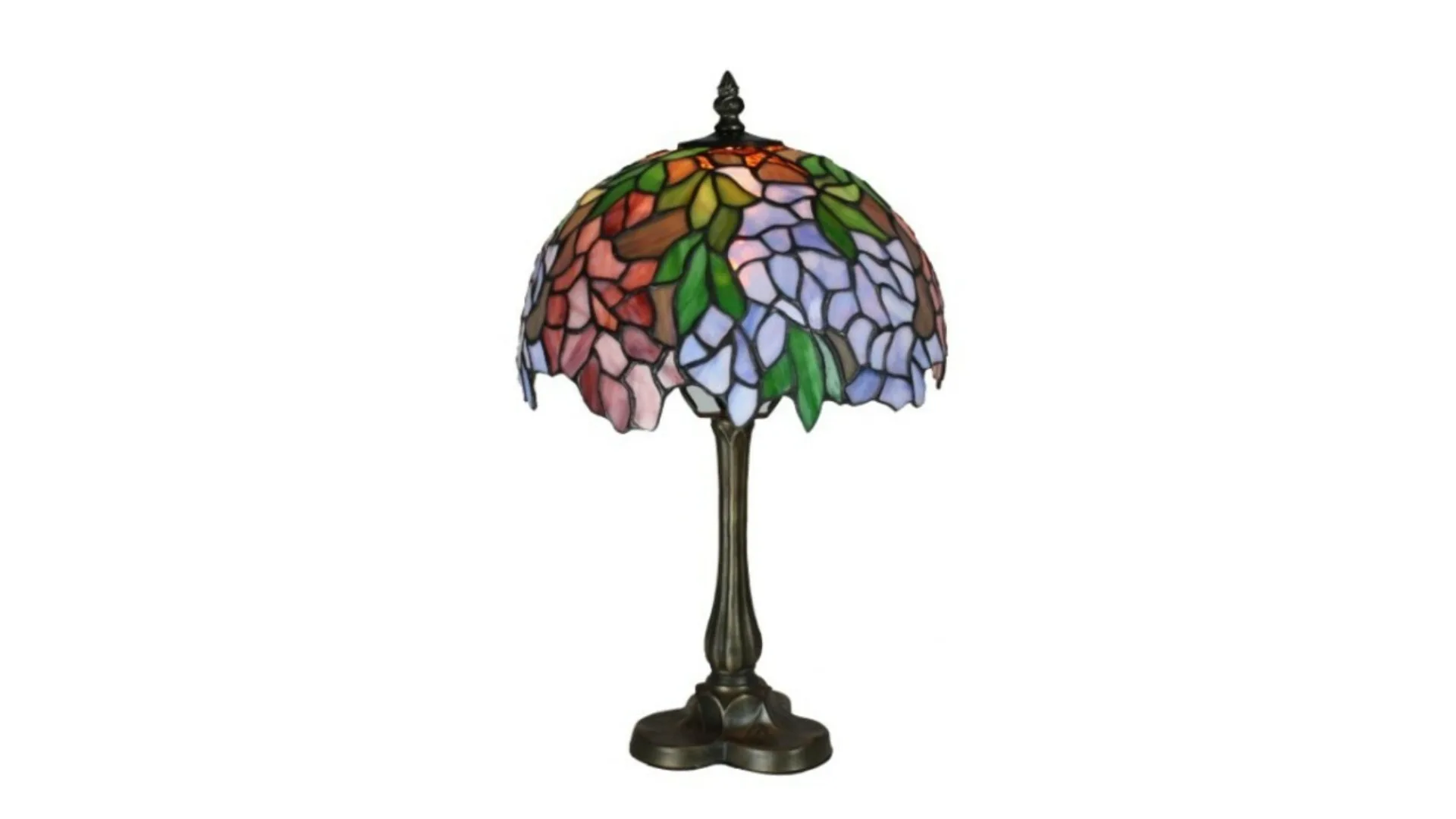 A classic Tiffany style table lamp with greens, reds, blues and purples on an ornate base.