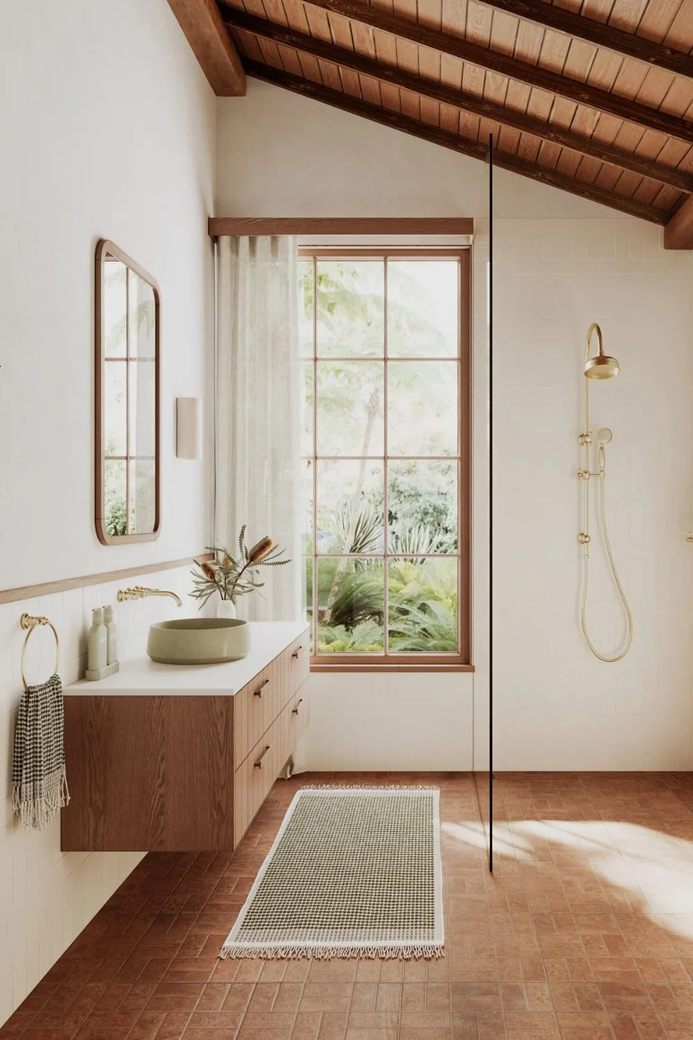 Brushed gold Phoenix tapware in timber-clad bathroom. 