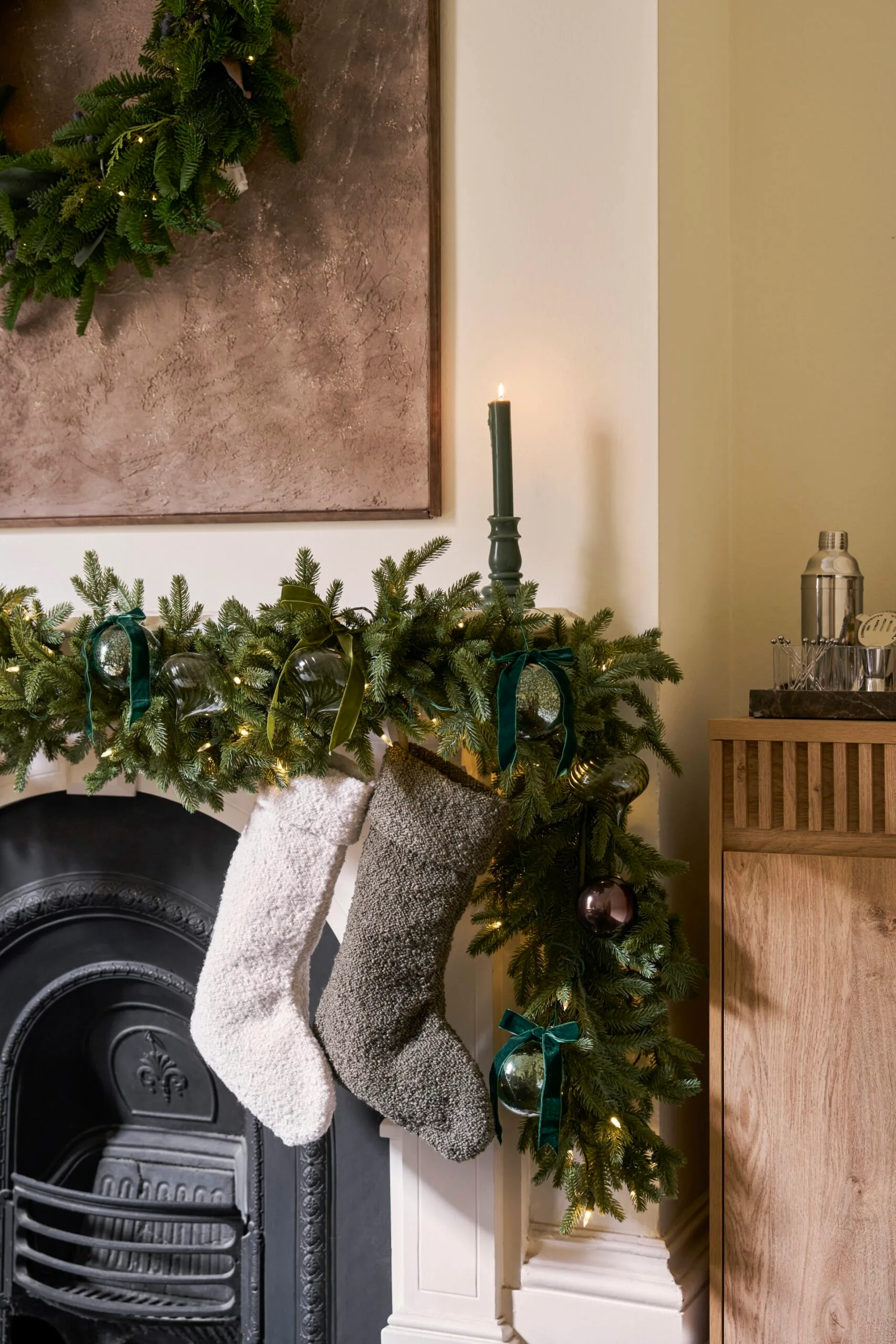 Christmas stockings hanging on a mantle. 
