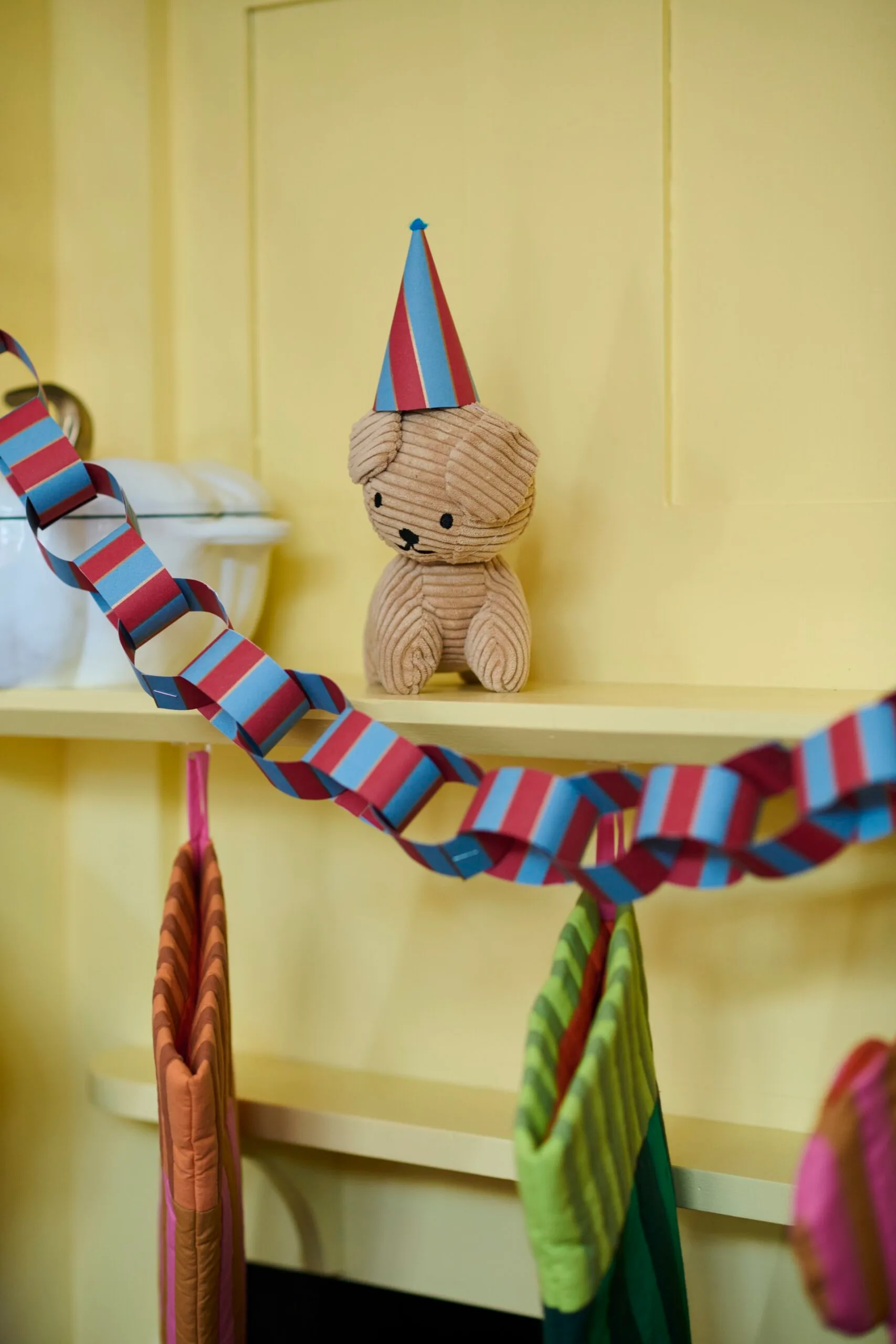 Jess Ngyuyen decorating her Christmas tree with her son.