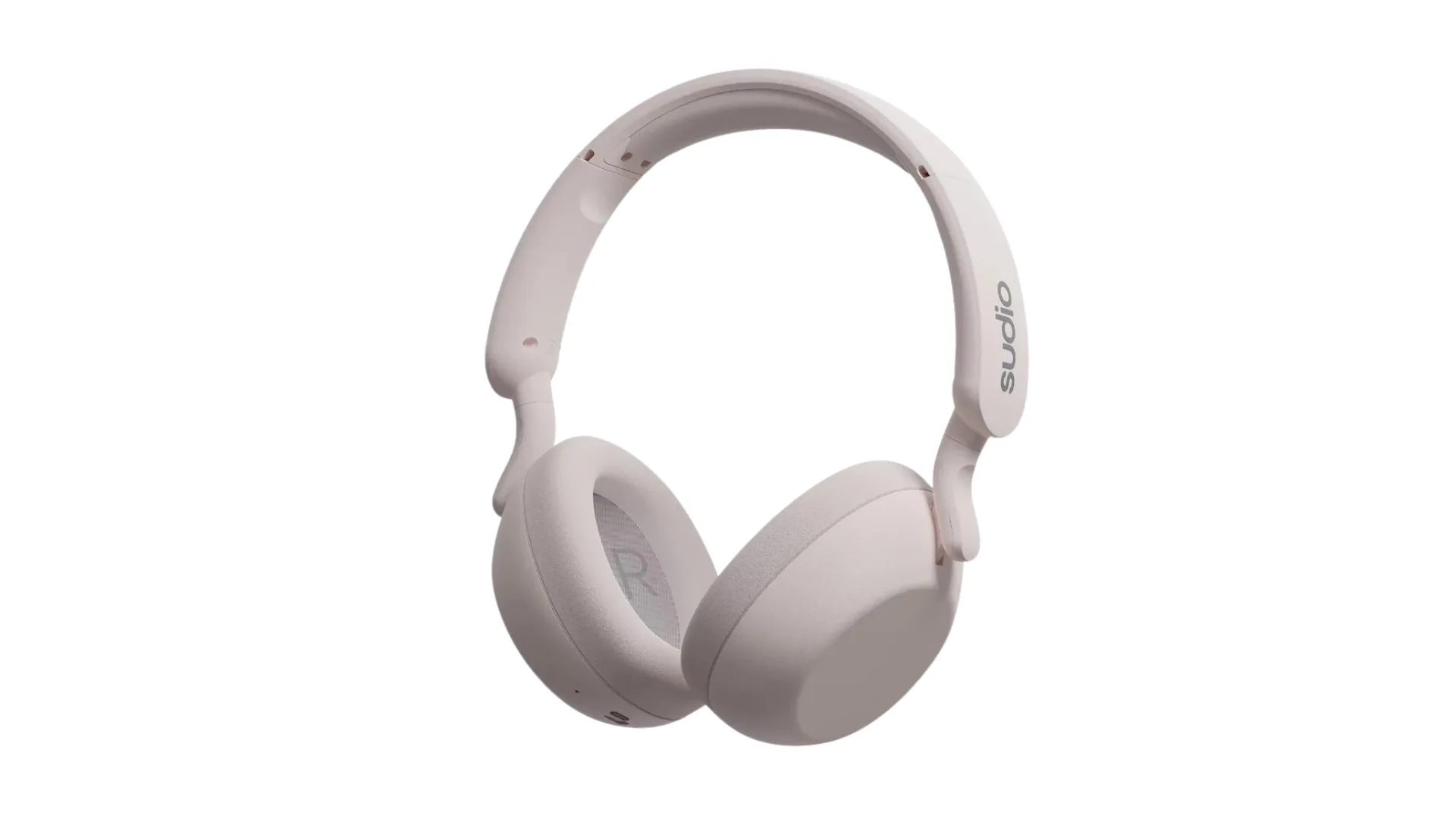 Over the ear headphones in a soft pink, almost white shade